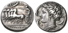 ‡ Sicily, Syracuse, tetradrachm, c. 380 BC, in the style of Euainetos, charioteer driving fast quadriga left, Nike flying right with wreath held in bo...