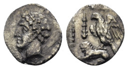 CILICIA, Uncertain. Circa 4th Century BC. AR Obol (9mm, 0.50 g). Young male head left, wearing wreath of grain / Eagle standing left on back of lion; ...