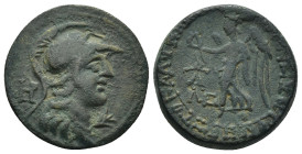 CILICIA, Seleukeia. 1st century BC-1st century AD. Æ (22mm, 7.27 g). Helmeted and draped bust of Athena right; monogram to left, branch below chin / N...