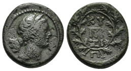 Mysia, Kyzikos, 2nd-1st century BC. Æ (18mm, 4.87 g). Head of Kore Soteira r., wearing wreath of grain. R/ KY-ZI and monogram within an oak wreath.