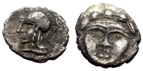 Obol AR
Pisidia, Selge, c. 350-300 BC, Facing gorgoneion with protruding tongue / Head of Athena to left, wearing crested Attic helmet, before astrag...