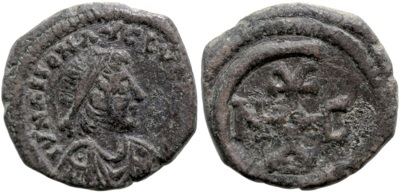 Byzantine
Justinian I (527-565 AD). Theoupolis (Antioch)
AE Pentanummium (14mm...