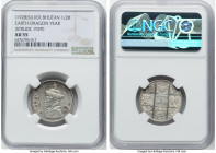 Jigme Wangchuck silver 1/2 Rupee ND (1928) AU55 NGC, Calcutta mint, KM24. Earth-Dragon Year. Mintage: 20,000. One year type (struck in 1929). HID09801...