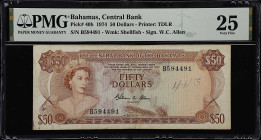 BAHAMAS. Central Bank of the Bahamas. 50 Dollars, 1974. P-40b. PMG Very Fine 25.
A tougher Allen signature and 1974 date. PMG Comments "Annotation."...