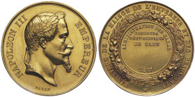 Second Empire 1852-1870
Médaille en or, 1865, AU 28.24 g. par Barre, poinçon abeille or
Avers : NAPOLEON III EMPEREUR
Revers : MINISTERE DE LA MAISON ...