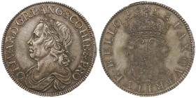 Oliver Cromwell 1653-1658
Crown, London, 1658, AG 29,92 g. 
Avers : OLIVARD GRPANG SCO HIB & PRO Buste lauré à gauche
Revers : PAX QVAERITVR BELLO Ecu...