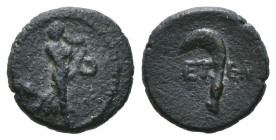 Greek Coins
PISIDIA. Etenna. Ae (1st century BC).
Obv: Nymph advancing right, head left, holding serpent; vase to left.
Rev: E - T.
Sickle-shaped knif...