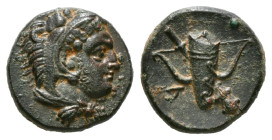 IONIA. Erythrai. Ae (Circa 400-375 BC).
Obv: Head of Herakles right, wearing lion skin.
Rev: Club, bow and quiver crossed in saltire; A to left.
BMC 8...