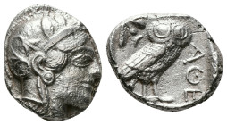 Greek Coins
ATTICA. Athens. Tetradrachm (Circa 454-404 BC).
Obv: Helmeted head of Athena right, with frontal eye.
Rev: AΘE.
Owl standing right, head f...