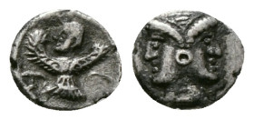 Greek Coins
CILICIA. Uncertain. (Circa 350 BC). AR Hemiobol.
Obv: Janiform head wearing taenia.
Rev: Male headed bird-deity with two wings and a tail
...