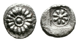 IONIA. Erythrai Tetartemorion (Circa 480-450 BC).
Obv: Rosette.
Rev: Flower in circle within incuse square.
Condition: Very fine.
Weight: 0,28 gr 
Dia...