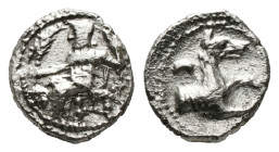 Greek Coins
LYCAONIA. Laranda. Obol (Circa 324/3 BC).
Obv: Baal seated left on throne, holding grain ear, grape bunch and sceptre.
Rev: Forepart of wo...