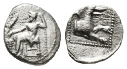 Greek Coins
LYCAONIA. Laranda. Obol (Circa 324/3 BC).
Obv: Baal seated left on throne, holding grain ear, grape bunch and sceptre.
Rev: Forepart of wo...