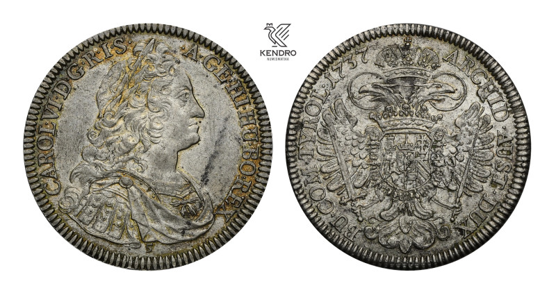 Charles VI. Thaler 1737. Hall.
Remains of mint lustre with gold patina! Flank d...