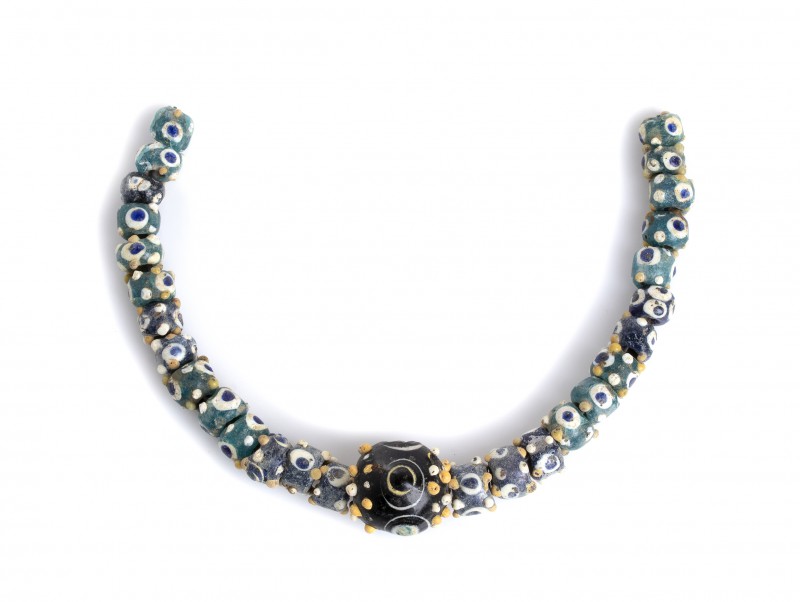 Carthaginian polychrome glass Eye Bead Necklace
4th - 3rd century BC; lenght cm...