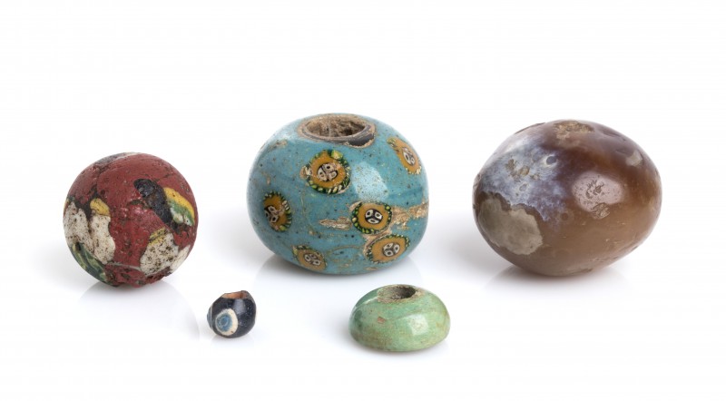 Group of five Egyptian Beads
1st century BC - 1st century AD; height max cm 2,6...