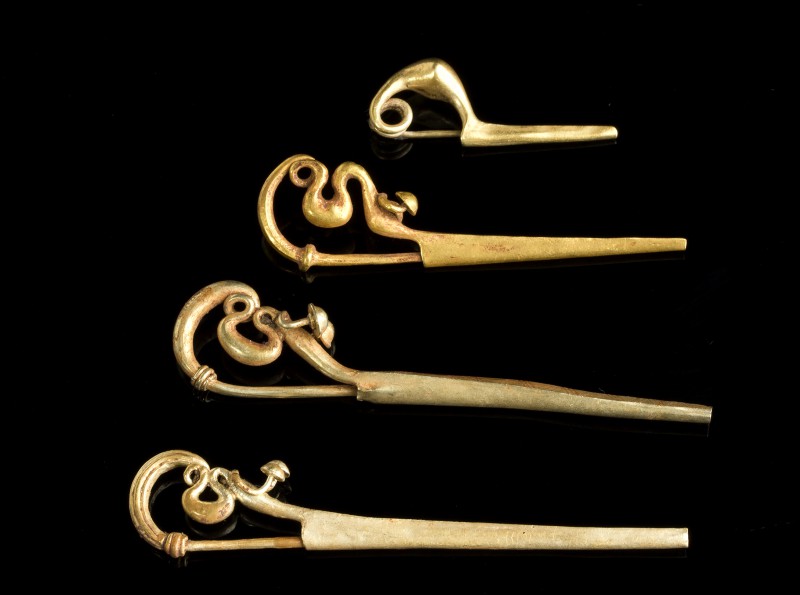 Group of four Etruscan Gold Fibulae
7th century BC; length max cm 6; gr 14,05 t...