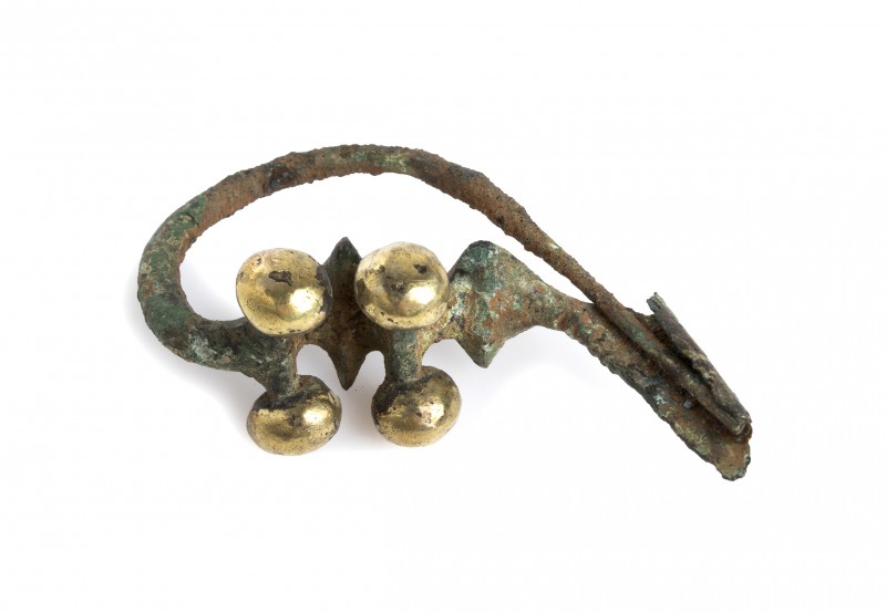 Etruscan Bronze and Gold Dragon-Type Fibula
7th century BC; length cm 5,7; Prov...