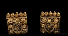 Pair of Etruscan Gold miniature Bauletto Earrings 
First half of 6th century BC; height mm 11 each; gr 1,79 tot; These earrings are miniature sculptu...