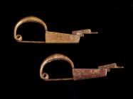 Couple of Greek Gold Fibulae
5th - 4th century BC; lenght cm 4,4 each; gr 7,09 tot; Engraved geometric symbols and duck's head terminals. Provenance:...