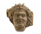 Etruscan Young Satyr Head Antefix
4th century BC; height cm 20; Traces of the original polychromy. Provenance: Property of a gentleman; acquired on t...