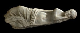 Roman Grey Marble Statue of a Sleeping Girl
2nd century AD; length m 1.13; Nude, with eyelids ajar, in an deep slumber; a drapery surrounds the head,...