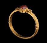 An etruscan carnelian scarab, mounted in a gold bracelet by Giacinto Melillo. Centaur, armed with two swords. Engraved employing two globular elements...