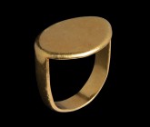 A greek gold ring. Smooth bezel. Sample from the classical period, type IX. Wear marks due to time and use. For comparisons: J. Boardman, Greek gems a...