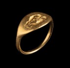 A greek gold ring. Hercules and the Nemean lion. The hero strangles the animal by choking it with his mighty arms. Sample from the classical period, t...