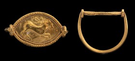 An etruscan gold ring. Horse. Bezel in the shape of an almonds (also said "eye shape"), embossed with the figure of a horse, galloping towards right; ...