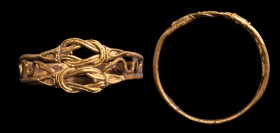 A greek gold ring. Double Hercules' knot. The ring is characterized by a thin, double hoop, in which there is a small snake inserted at each side, and...