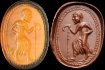 An italic carnelian intaglio. Male character with a stick. The bearded figure is wearing a long dress, and advances towards the right holding a stick ...