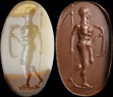 An italic banded agate intaglio. Warrior. The male figure, standing and turned to the left, is holding the spear in his right hand and the shield in t...