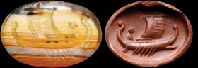 A roman republican intaglio in banded agate. Ship. The watercraft is turned to the left, in full sail; it has a rostrum on the bow and the helmsman on...