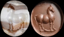 An italic banded agate intaglio. Horse. Work carried out employing globular elements. Ground line. End of the 2nd - beginning of the 1st century B.C
...