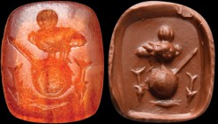A roman carnelian agate intaglio. Allegorical emblem. In the center there is a shield, upon which there is a female owl; behind, we can spot a spear, ...