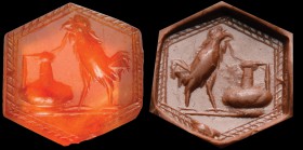 A roman carnelian intaglio. Cock and vase. The bird is tightening a snake in its beak, pulling it out of the edge of the vase, which has a flattened p...