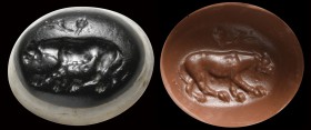 A roman double-layer onyx intaglio. The Dionysian panther. The mighty feline is advancing; behind there is a thyrsus. Interesting work, characterized ...