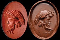 A roman red jasper intaglio. Gryllos. The hybrid composition is made of a male head, with an eagle on top; a lion head comes out from the character's ...