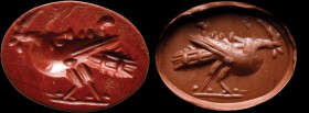 A roman red jasper intaglio. Gryllos. The fantastic creature is made of a human face, his profile turned upwards, and grafted on an avian body, which ...