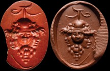 A roman red jasper intaglio. Gryllos. Five masks are joined to a bunch of grapes: two bearded masks of sylenus (above) and three masks of youth (under...