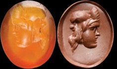A roman carnelian intaglio. Gryllos. The hybrid composition is made of two conjoined theater masks, one of a Silenus and one of a youth. 2nd century A...