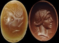 A roman double layer agate intaglio. Bust of Artemis, she has the quiver on her back. Inscription at the bottom: R-A-P. Intaglio carried out with clea...