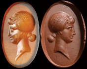 A roman sard intaglio. Head of a roman noblewoman. The effigy, turned to the right, is stylistically and physiognomically ascribable to the portrait t...