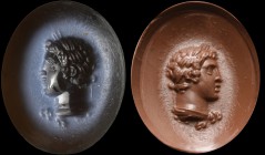 A roman nicolo intaglio. Bust of young Hercules. The hero, with laurel wreath, is turned to the left, with the nemean lion skin tightened under the ne...