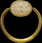 A roman chalcedony intaglio, mounted on an ancient gold ring. Tyche. The goddess is turned to the left, holding the cornucopia with her left arm and t...