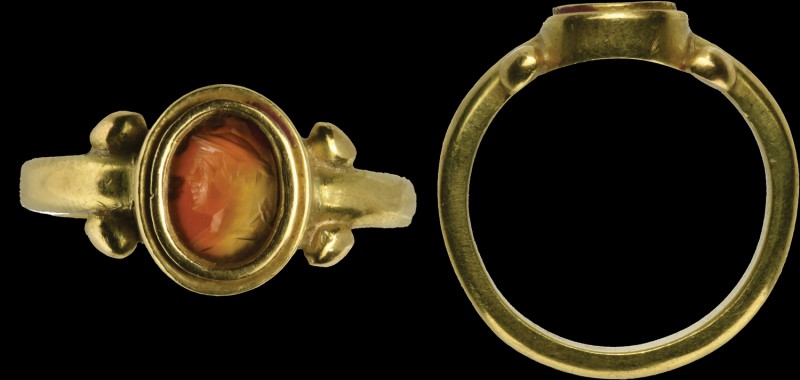 A roman carnelian intaglio mounted in a gold ring. Bust of Mercury. The god is t...