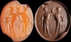 A roman carnelian intaglio. The Dioscuri. The two figures (above which there is a star, in the field) are standing and both armed with spear and sword...