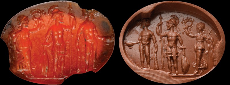 A roman carnelian intaglio. Mythological scene. On the left, a winged victory is...