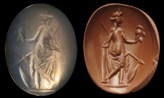 A roman chalcedony intaglio. Venus Victrix. The goddess, turned to the left, is partially draped and leaning on a column. She is holding the helmet in...
